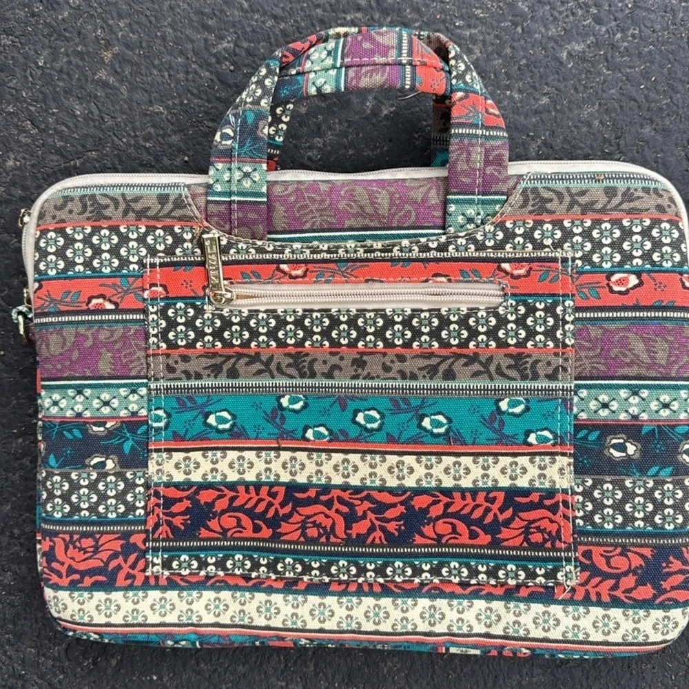 Kinmac bohemian vibe fabric multi pocketed zipper closure laptop/tablet bag.
